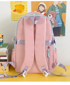 Pink blue student schoolbag back view detail, comfortable adjustable straps, daily backpack.