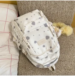Korean style fresh printed canvas backpack for women, stylish daily school bag for students.