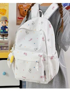 Detailed view of white cute cat print school backpack, stylish casual korean style daypack.