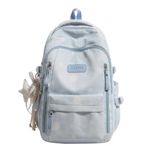 Sweet light blue polka dot backpack for girls, cute casual student school bag with charms.