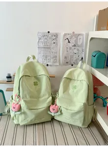 Casual light green canvas school backpack for female students ins style daily bookbag.