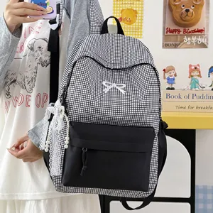 Sac à dos à carreaux noir et blanc avec nœud mignon et pendentif perle pour le quotidien