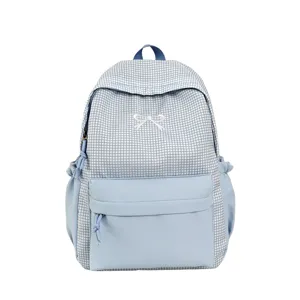 Sac à dos à carreaux bleu décontracté pour femme avec broderie nœud, cartable élégant et stylé.