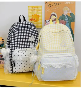 Cute plaid lace detail backpack set with heart pendant, sweet school bag for students. Detail view.
