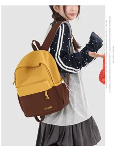 Zaino colorblock stile college per studenti e viaggi casual quotidiani con grande capienza.