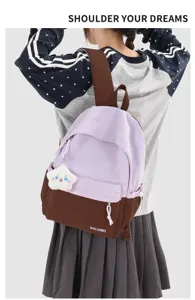 Zaino in tela stile college casual viola e marrone con grazioso ciondolo a stella.