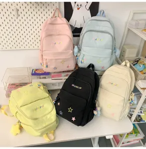 Multi-color casual backpack detail, cute star embroidery and front pocket design for daily use.