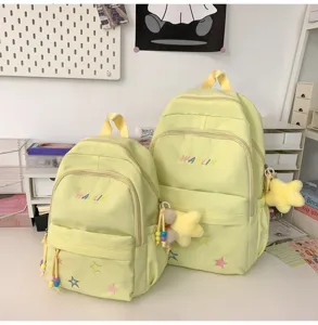 Cute pastel yellow school backpack set for teen girls, large capacity ins style casual travel bag.