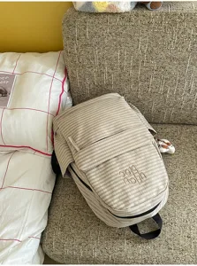 Casual striped canvas backpack, Korean style lightweight school bag for women daily use.