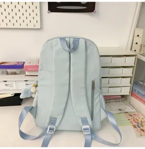 Lightweight casual blue backpack for daily school travel, large capacity and stylish design.