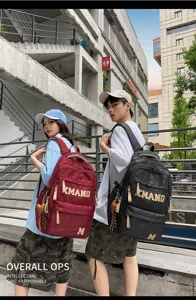 Large capacity student backpack vintage letter casual travel bag for men and women stylish.