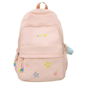 Pink casual backpack for women, large capacity stylish school bag for daily travel and commute.