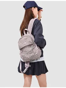 Mini sac à dos à pois style coréen pour femme, petit sac de jour tendance et élégant.