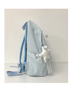 Japanese style light blue polka dot school backpack with cute star plush pendant and side pockets.