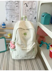Simple solid color casual canvas backpack for women school bookbag with cute clover embroidery.
