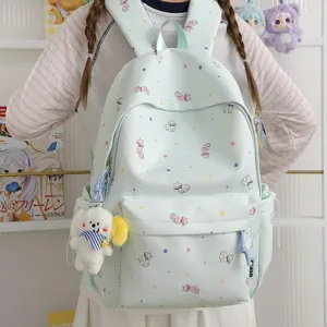 Korean style minimalist cute cat print school backpack with plush pendant for students travel.