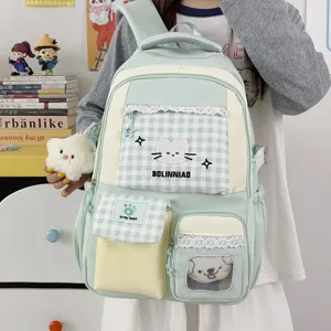 Zaino da scuola in tela stile coreano con ricamo di gatto kawaii e ciondolo soffice.