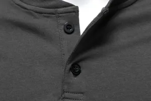Close-up detail of mens casual henley collar t-shirt in dark grey with two buttons.