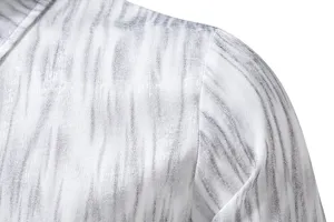Men's casual long sleeve shirt detail view with vintage distressed print pattern for autumn.
