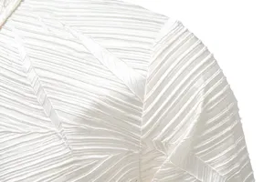 White pleated shirt fabric detail close-up, premium texture men clothing fabric texture view.