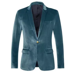Close-up view of the teal velvet blazer lapel, single gold button detail, and fine fabric texture.