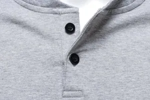 Close-up detail of mens grey cotton stretch Henley collar long sleeve t-shirt design.