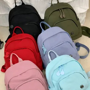 Minimalist mini backpack for women, cute casual small daypack for summer travel daily use.