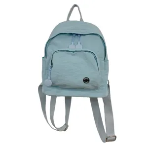 Minimalist mini backpack in light blue for women, perfect for daily casual travel and shopping.