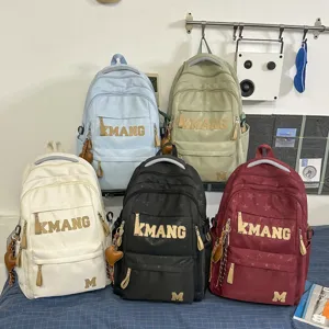 Stylish retro large letter student backpack, casual large capacity travel bag for all.