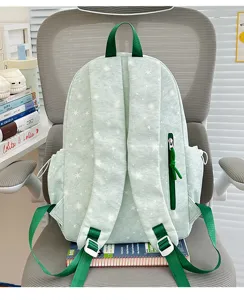 Light green star-patterned casual backpack with adjustable straps and zipper pocket for students.
