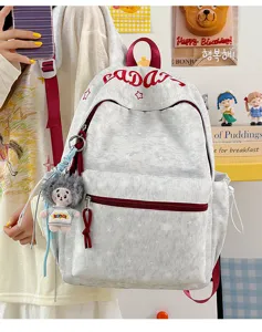 Casual printed canvas backpack for students, large capacity grey school bag with doll pendant.