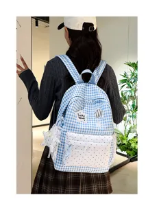 Korean sweet blue checkered backpack for women, large capacity cute school bag with charm.