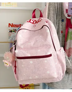 Casual printed pink backpack with star pattern and cute plush pendant for daily commute.