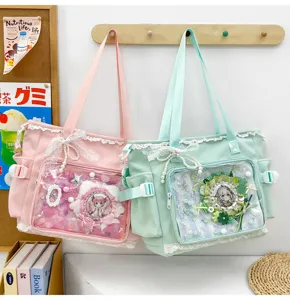 Cute anime canvas ita shoulder crossbody bag with transparent display window for student daily use.