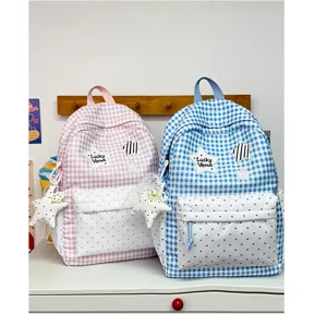 Cute aesthetic gingham school backpack with heart front pocket for women and teen girls.