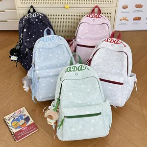 Casual star printed backpack for school and daily commute with cute plush pendant.