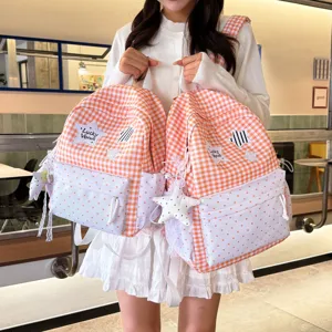 Korean style sweet campus backpack with orange gingham and heart pattern main view display.