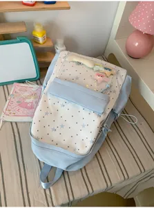 Japanese style sweet star pattern school backpack with clear front pocket for daily use.