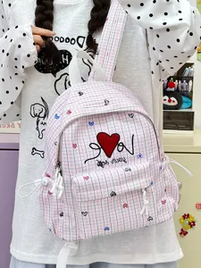 Japanese ins style pink plaid backpack with heart embroidery for school and casual daily travel.