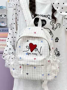 Japanese style casual plaid backpack with cute heart embroidery, versatile school bag for daily use.