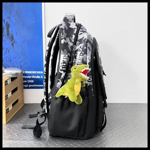 Trendy camo utility backpack for students stylish casual school bookbag with dinosaur pendant
