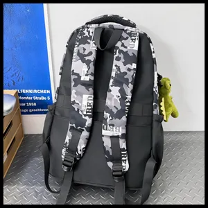 Camouflage student backpack detail view, featuring durable shoulder straps and stylish design.
