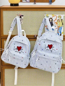 Joli sac à dos scolaire à carreaux bleu et blanc sac décontracté quotidien pour femmes et filles.