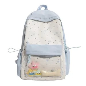 Cute Japanese style star print backpack with clear front pocket and plush toys for daily school use.