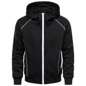 Close-up detail view of black zip-up hoodie featuring contrast white stitching and front zipper.