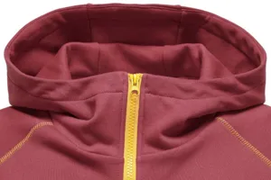 Detailed close-up of burgundy hooded sweatshirt featuring contrast yellow zipper and stitching.