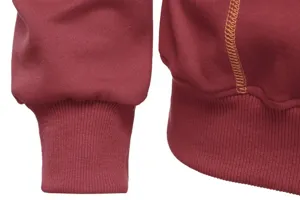 Detail shot of burgundy hoodie cuff and hem featuring contrast stitching and ribbed knit design.