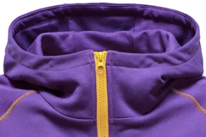 Detail view of a purple zip-up hoodie with yellow zipper and contrast stitching for active wear.
