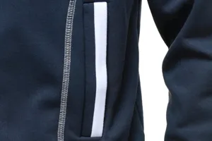 Detailed view of the dark blue zip-up hoodie featuring contrast white pocket trim and stitching.