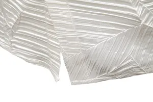 Men casual pleated long sleeve shirt fabric detail view showing unique texture and side slit.